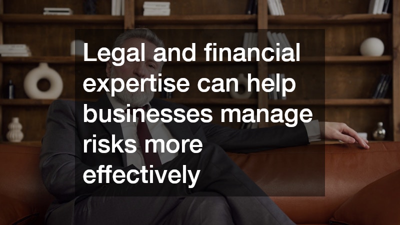 man in a suit sitting on a couch